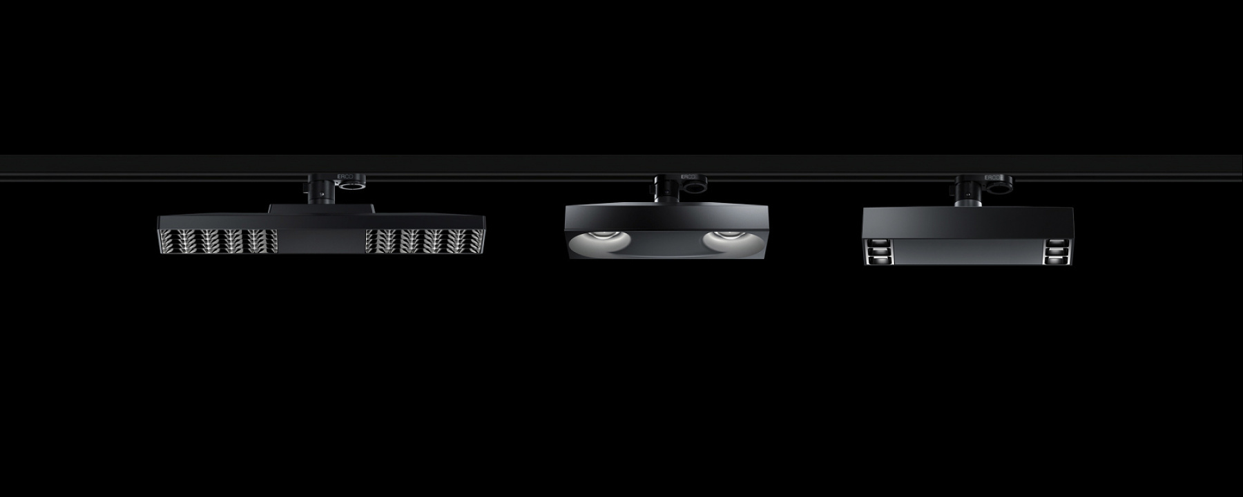 ERCO Jilly track-mounted downlights for flexible office lighting solutions in modern workspaces.