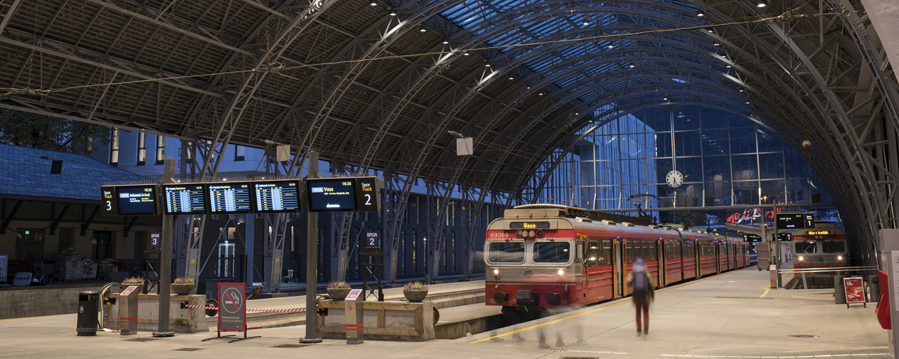 Train station illuminated by robust ERCO outdoor luminaires, designed for demanding environments.