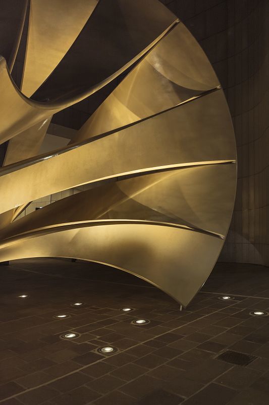 Charles Perrys Shell Mace sculpture illuminated by ERCO Tesis in-ground luminaires, Melbourne.