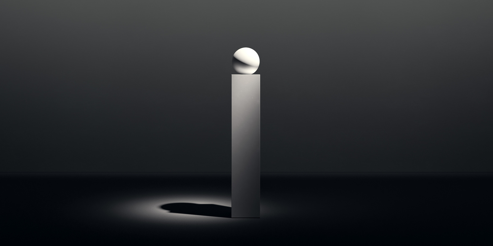 ERCO lighting design: A sphere atop a pedestal, illuminated for architectural emphasis.