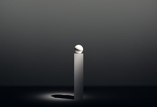 Sphere on a pedestal, illuminated to demonstrate play of brilliants.