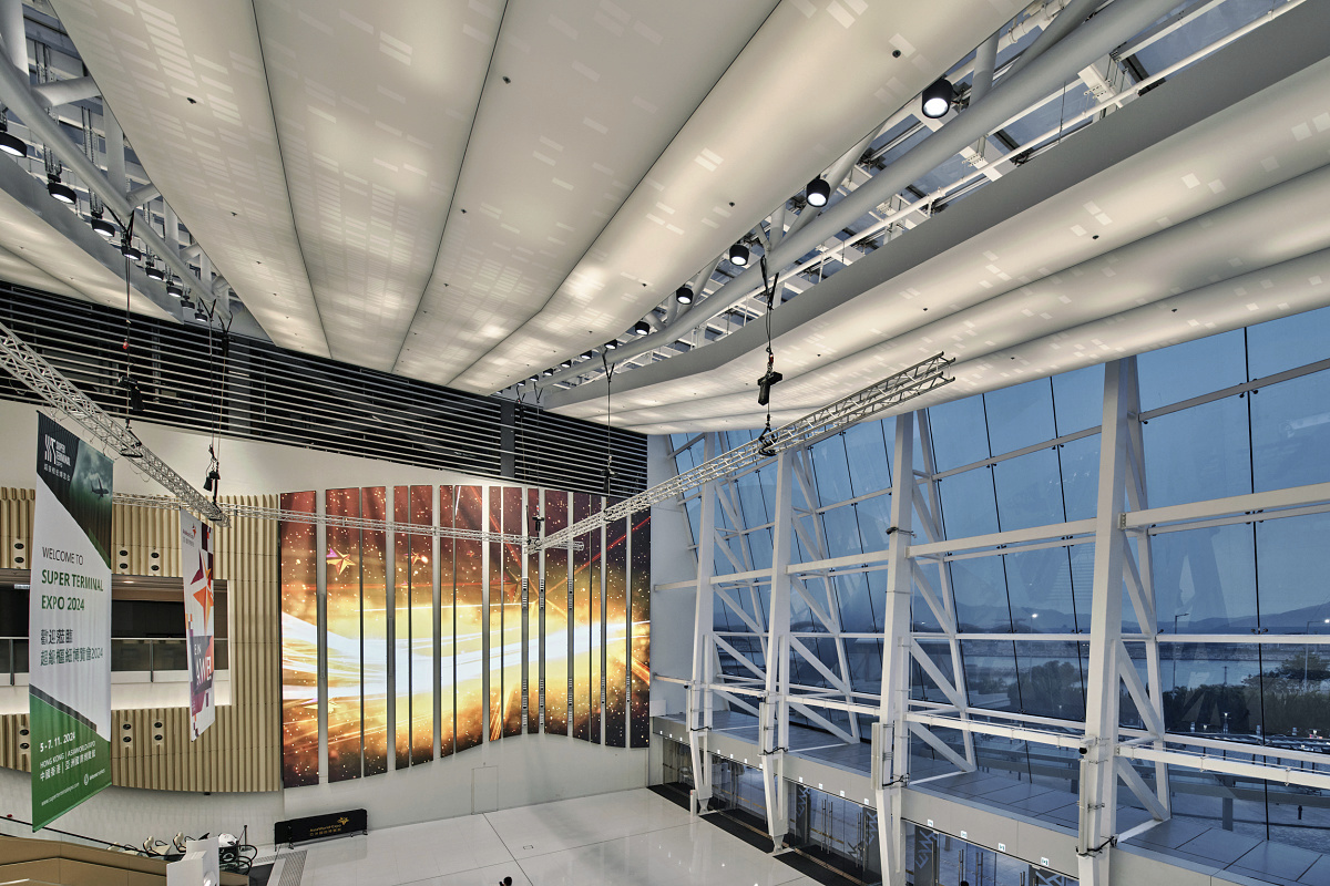 Asia World-Expo East Lobby illuminated by ERCO Kona floodlights, creating uniform light.