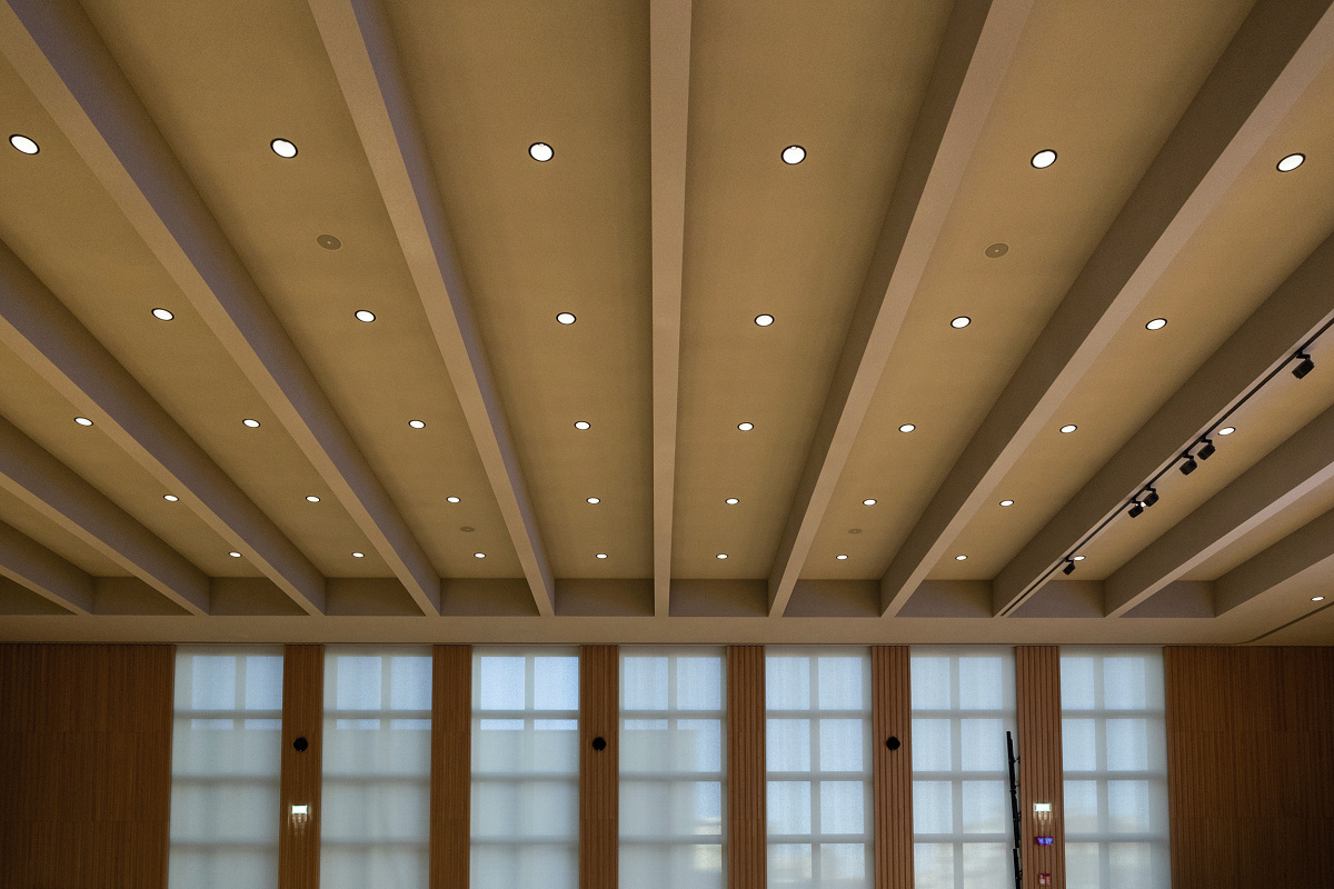 ERCO LED downlights provide uniform lighting in the Bocconi University auditorium, Milan.