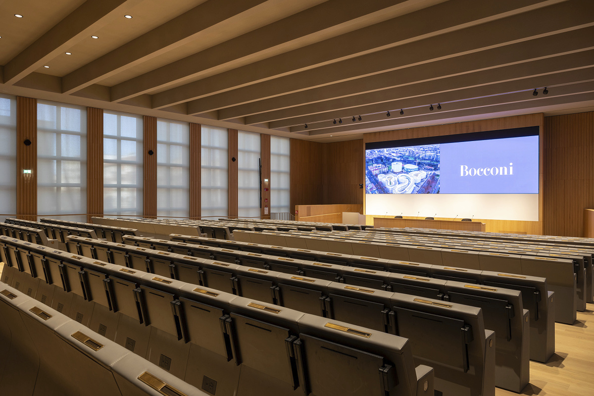 Bocconi University auditorium in Milan, featuring ERCO LED lighting for lectures and presentations.