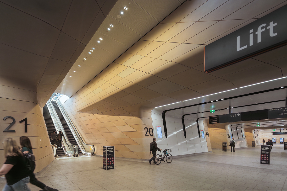 Interior of Sydneys Central Station featuring ERCO Lightscan LEDs and escalators.
