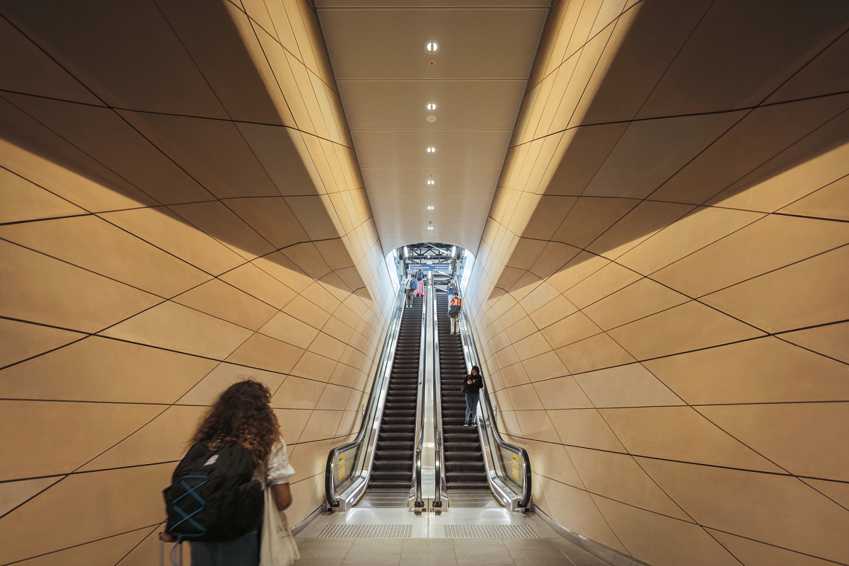 Escalators at Central Station Sydney, featuring ERCO lighting for comfortable light.