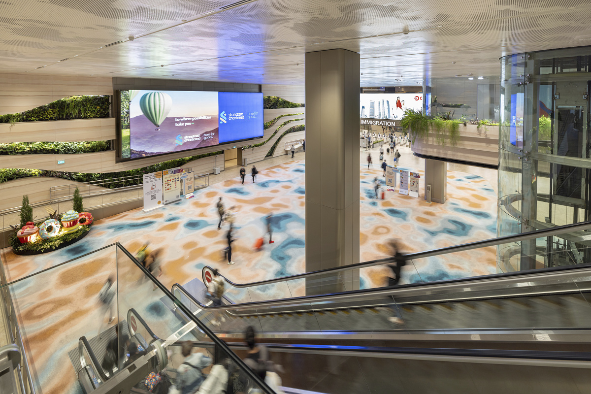 Changi Airport Terminal 2 with sustainable ERCO LED downlights for comfortable lighting.