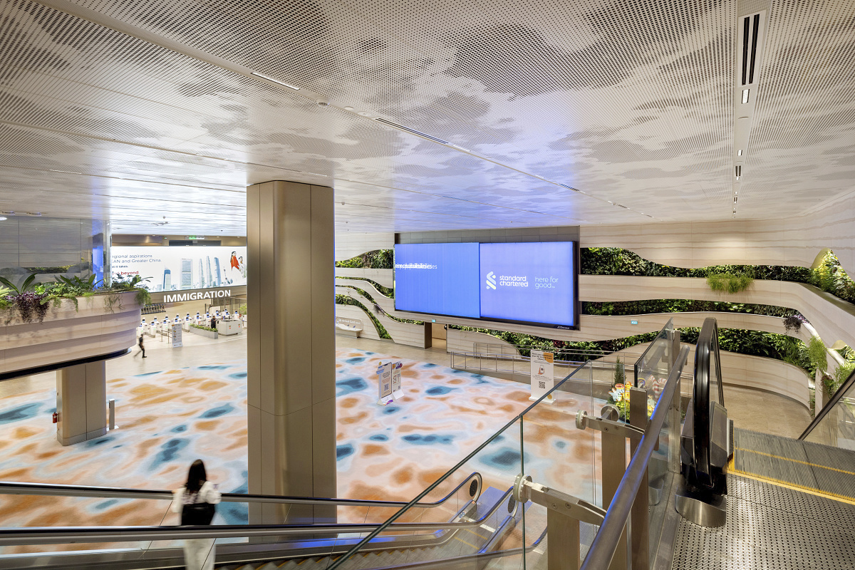 ERCO Compar downlights illuminate Changi Airport's Terminal 2, Singapore, with sustainable LED lighting.