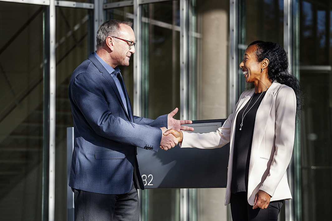 ERCO partners shaking hands, sealing a collaborative agreement.