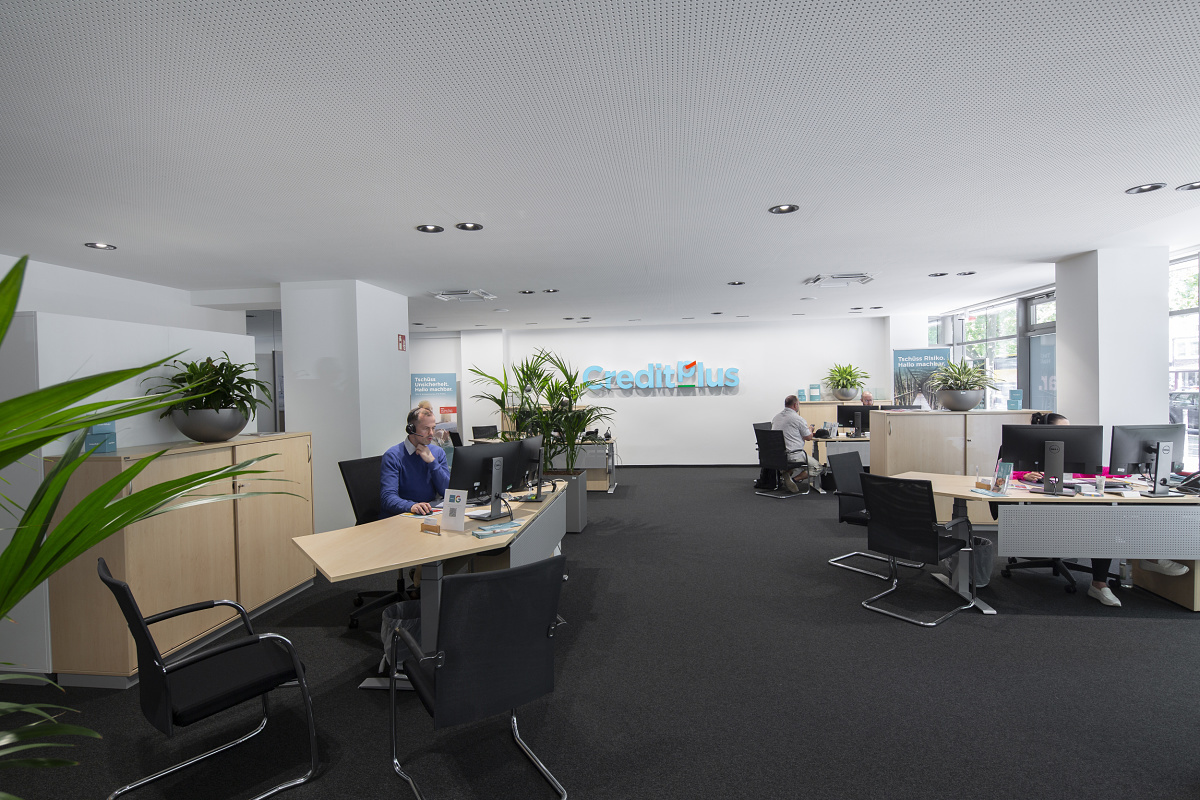 Creditplus Bank AG office featuring ERCO Skim downlights for ambient lighting and visual comfort.