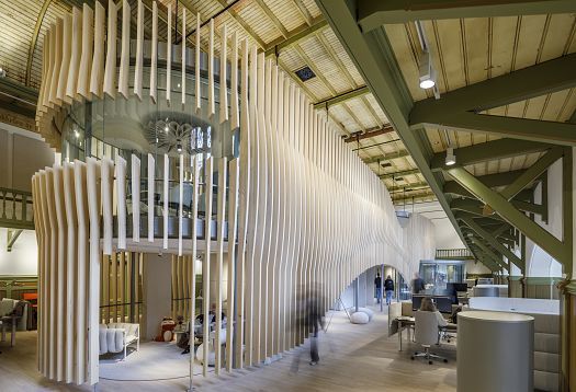 ERCO lighting at De Krakeling, Amsterdam: Flexible office lighting in a historic building, providing high visual comfort.