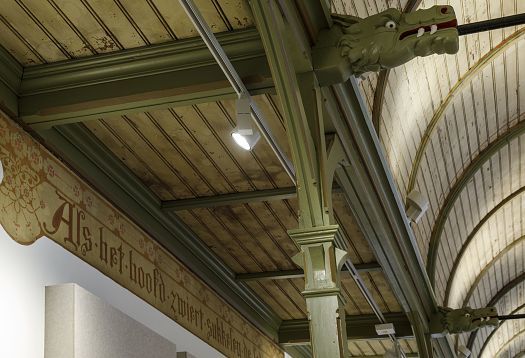 ERCO Optec spotlights illuminate the historic ceiling of De Krakeling with decorative dragons.