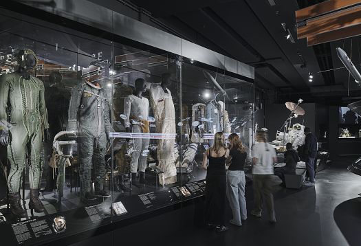 ERCO LED lighting at Deutsches Museum, Munich: Visitors view exhibits in display cases.