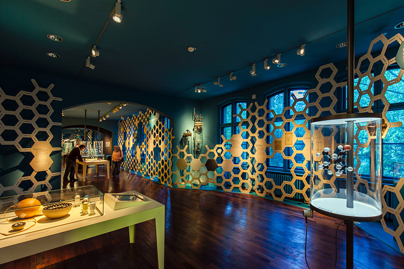 Chemistry exhibit at the Deutsches Technikmuseum Berlin, lit with ERCO LED spotlights for energy efficiency.