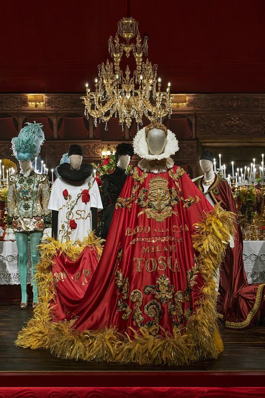 Dolce & Gabbana exhibit featuring illuminated fashion at Palazzo Reale, Milan.