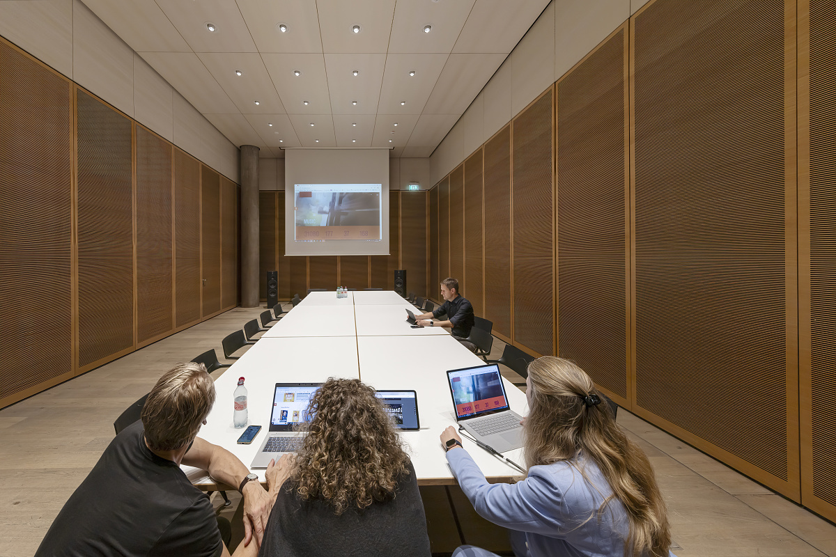 Edel Auditorium in Hamburg featuring ERCO Quinta recessed spotlights for LED lighting.
