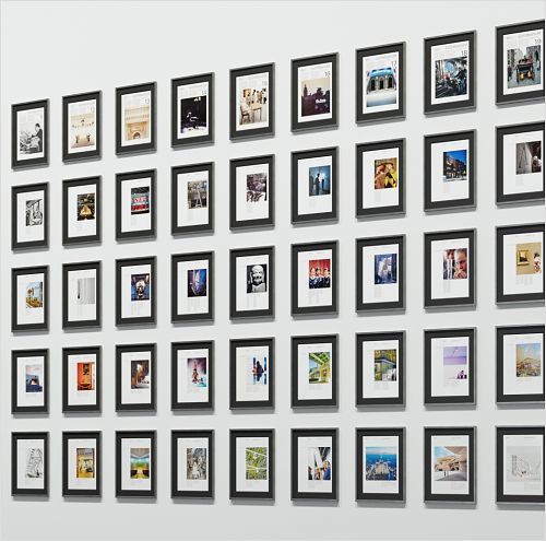 Gallery lighting: Framed pictures on a wall, illuminated by ERCO LED spotlights.