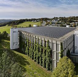 ERCO light factory with solar panels, showcasing sustainable lighting production with Greenology.
