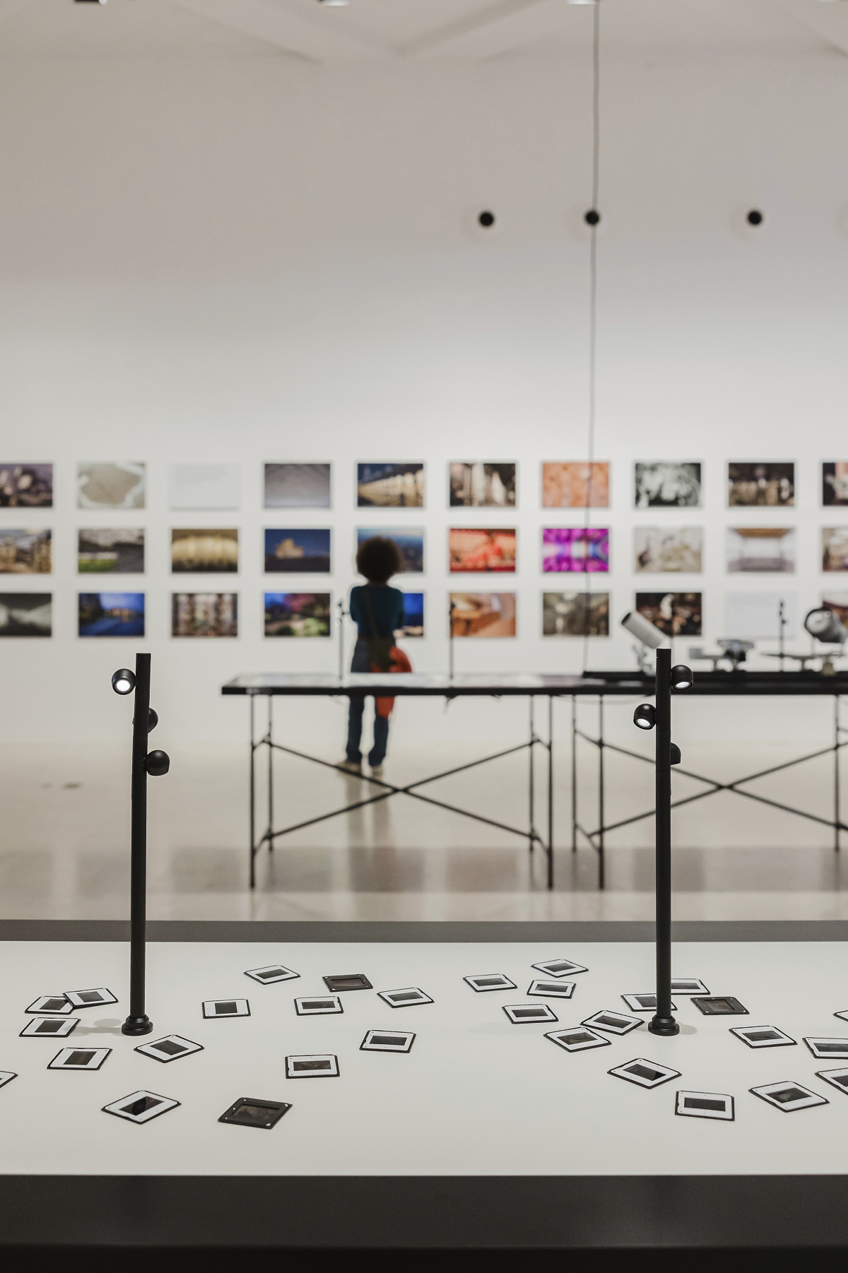ERCO Light Box exhibition in Milan featuring LED lighting and photography.