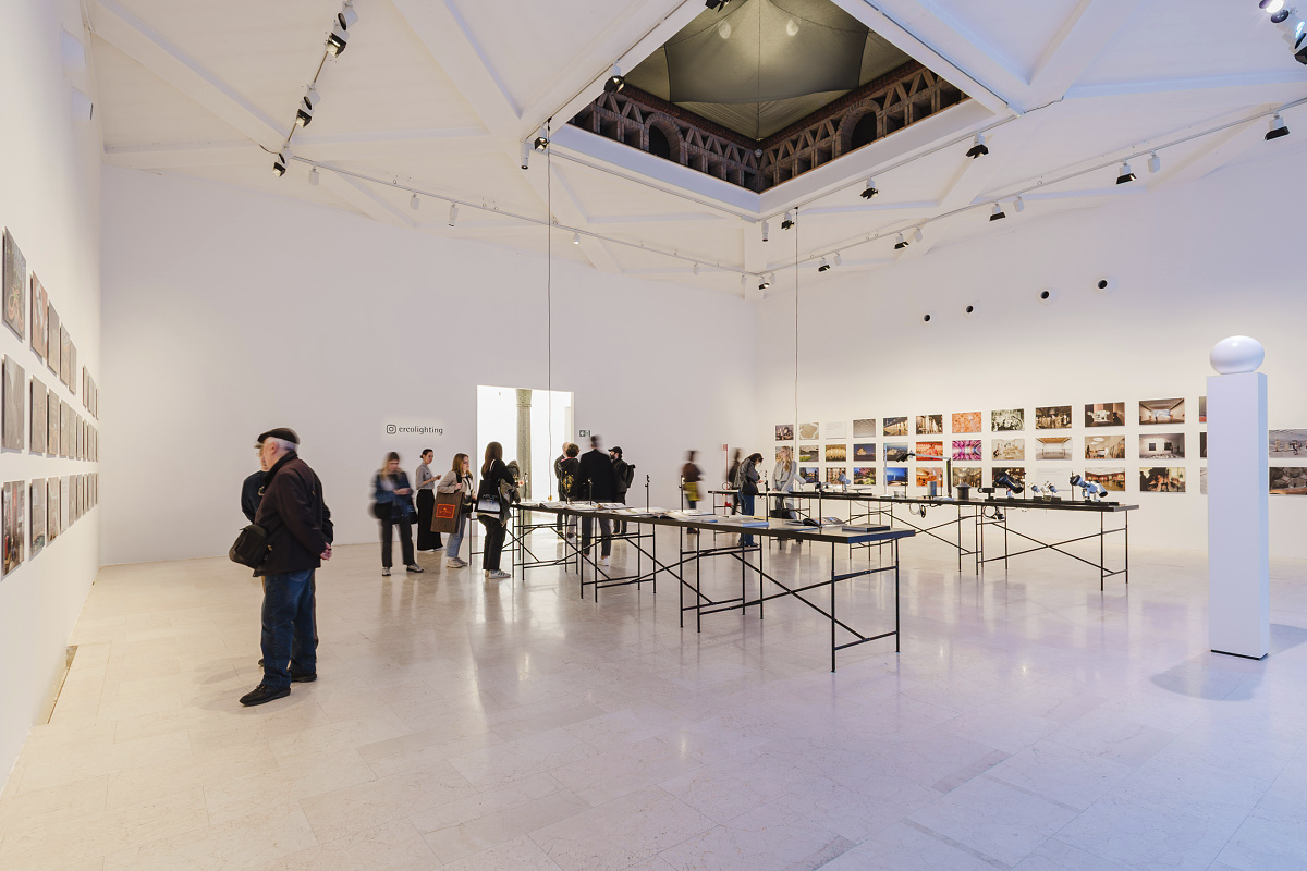 ERCO Light Box exhibition in Milan featuring ERCO LED lighting and visitors.