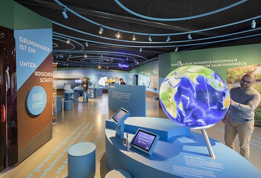 ERCO track system in a museum, providing flexible lighting for exhibits.