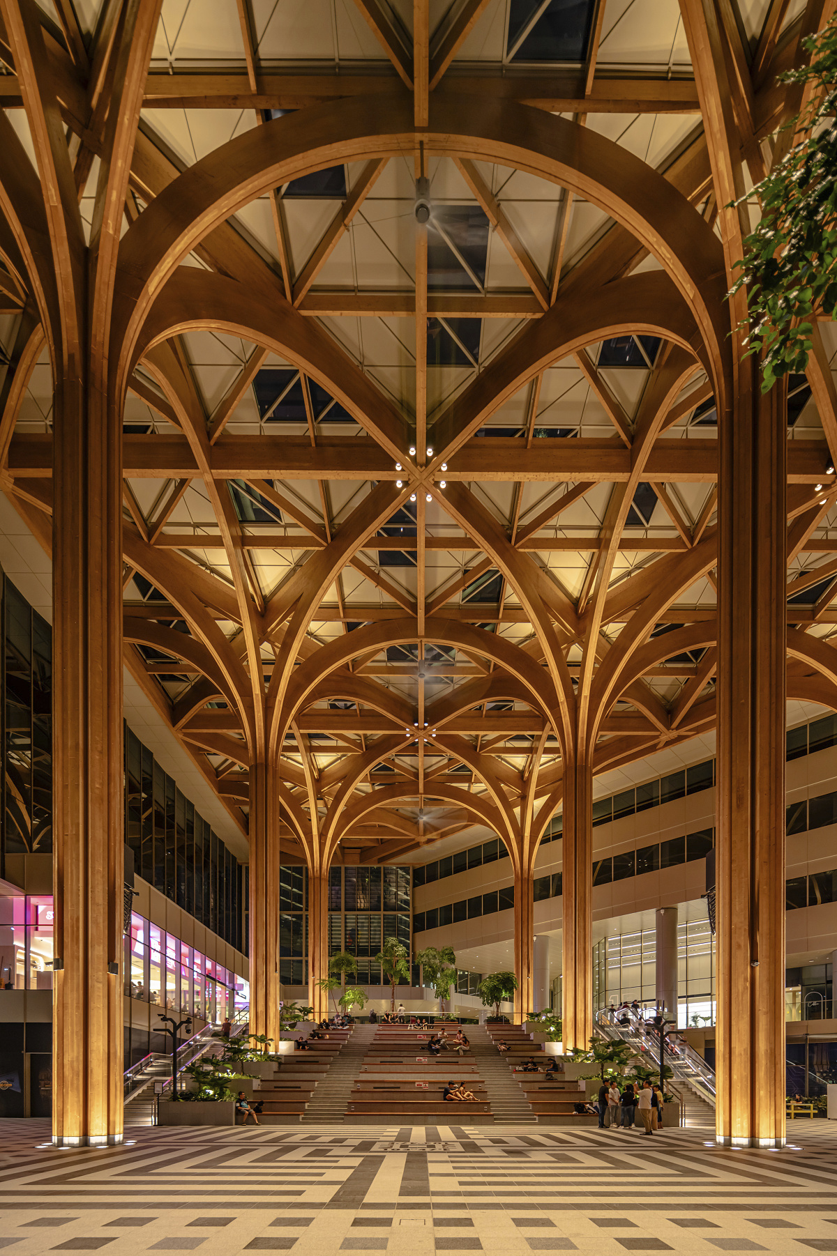 ERCO Atrium Double Focus luminaires illuminate the high ceiling at Geneo, Singapore Science Park.