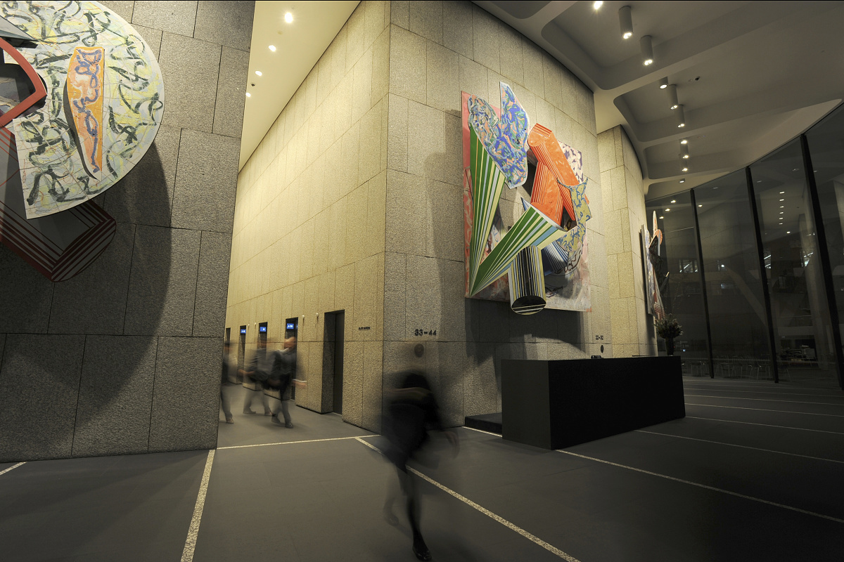MLC Centre lobby featuring art and ERCO wallwashing for high ceilings.