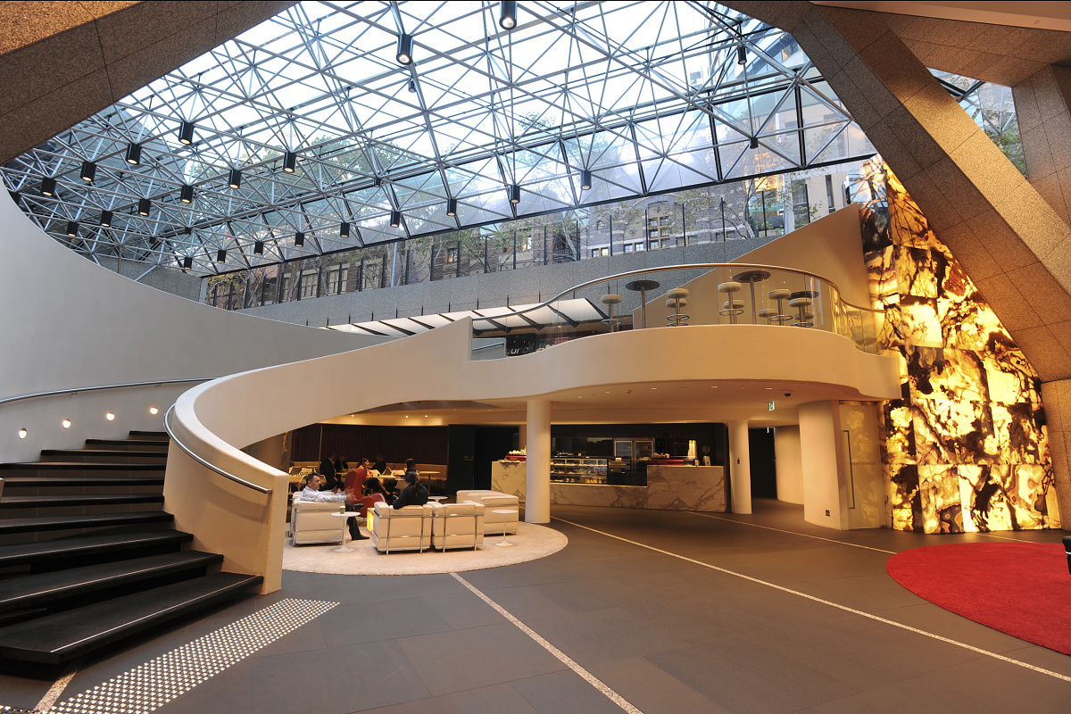 Shell House interior in Melbourne featuring ERCO downlights and wallwashers highlighting artwork.