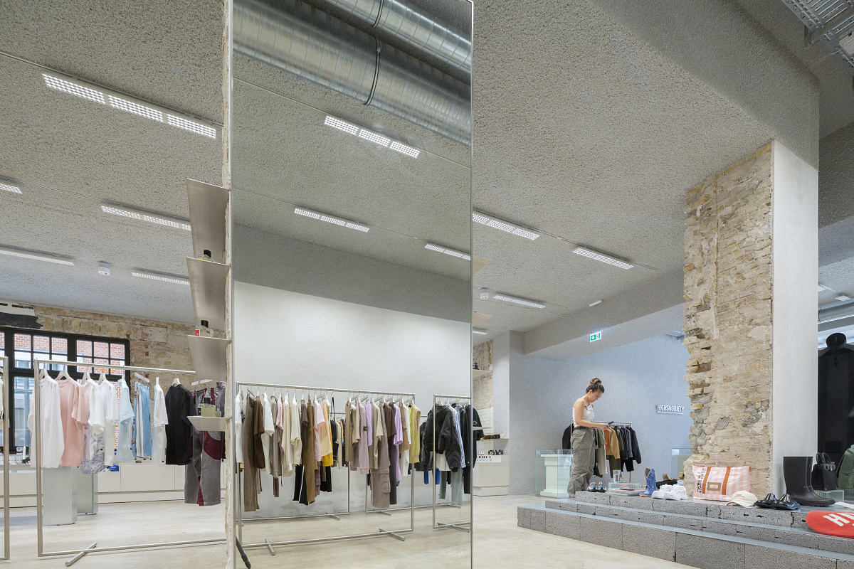 Highsnobiety Berlin store featuring Jilly LED downlights for flexible shop lighting.