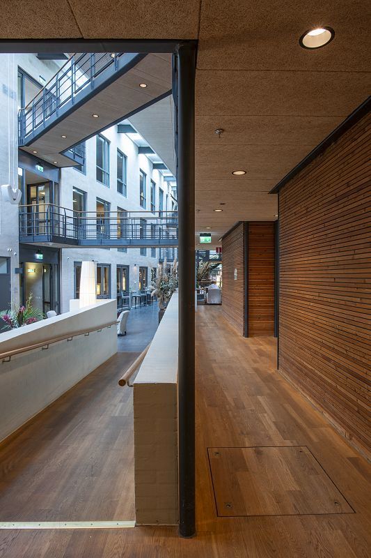 Hotel Skansen interior featuring ERCO Iku lights for glare-free ambient lighting.