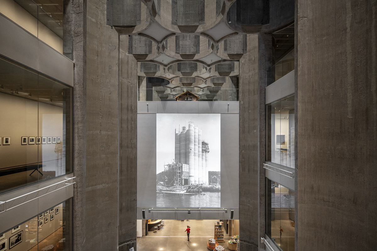 Interior of Kunstsilo Kristiansand, featuring concrete architecture and ERCO exhibition lighting.