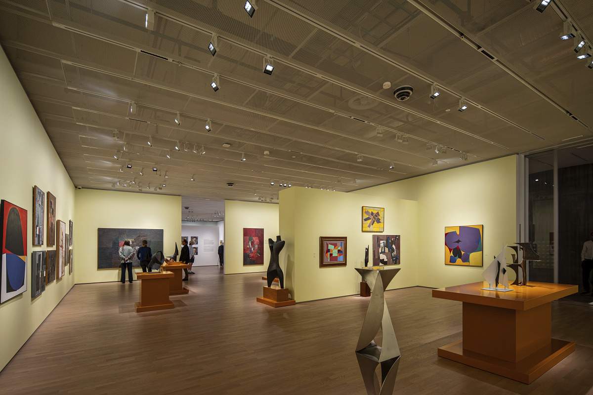 Kunstsilo Kristiansand art museum with ERCO track spotlights illuminating art exhibits.
