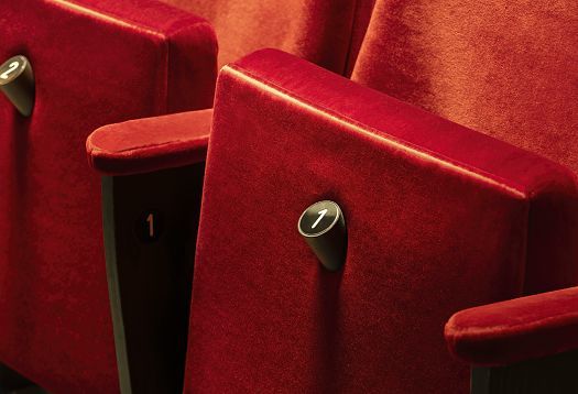 Red seats in Hamburg State Opera featuring new LED lighting.