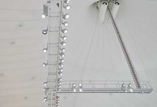 ERCO Kona LED spotlights providing efficient lighting under the tent roof of Munichs Olympic swimming pool.