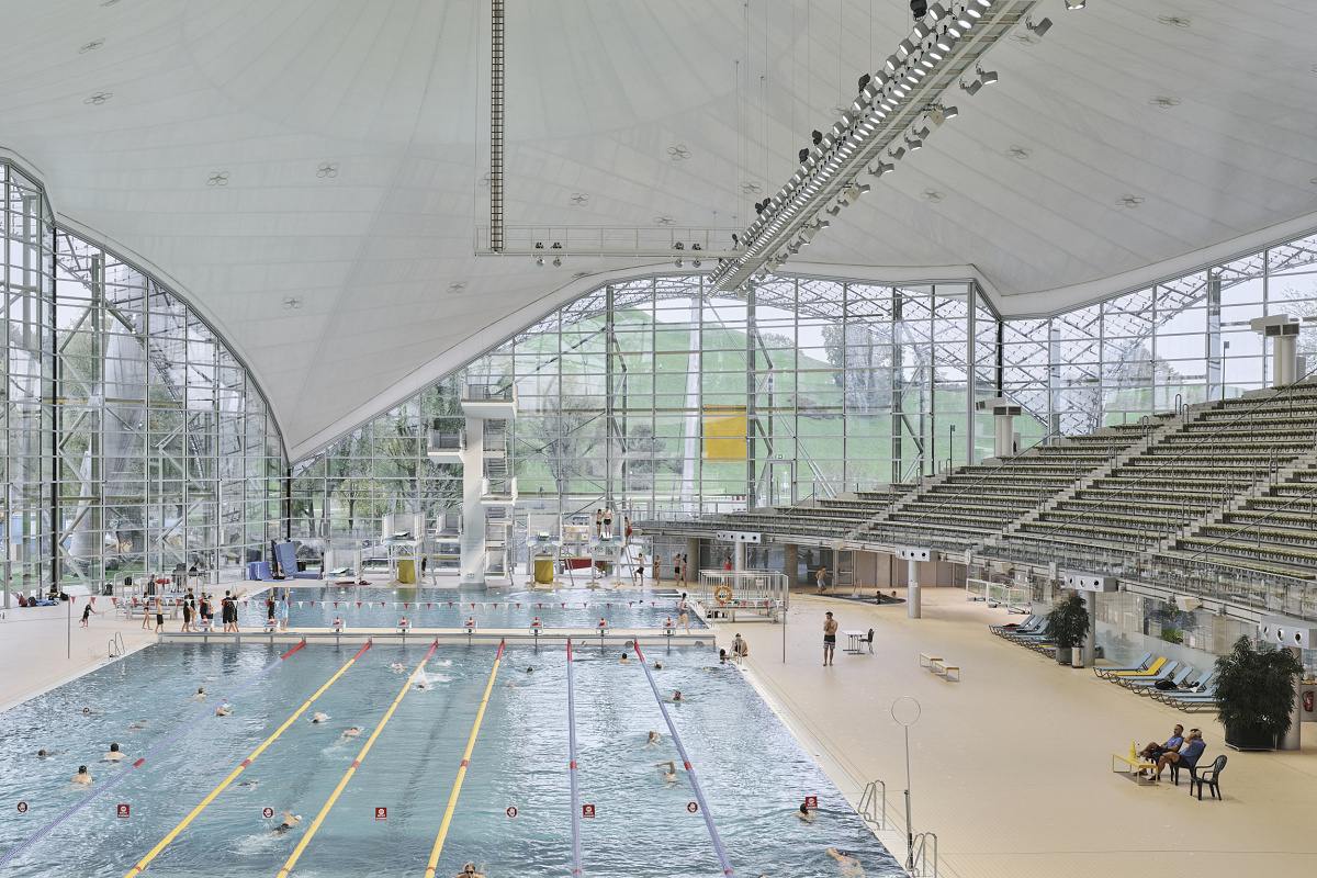 Aquatic Centre at Olympic Park, Munich, relit with energy-efficient ERCO Kona LED spotlights.