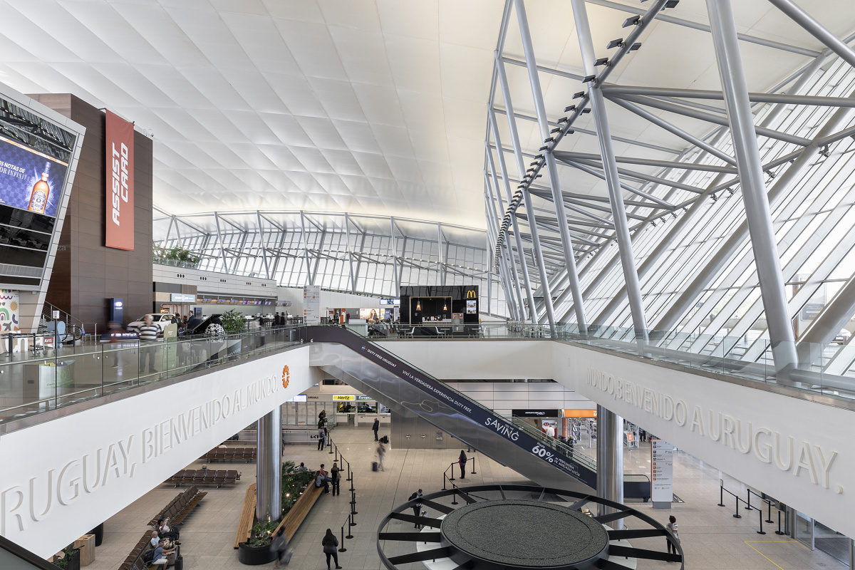 Carrasco Airport's terminal illuminated by ERCO LED lighting.