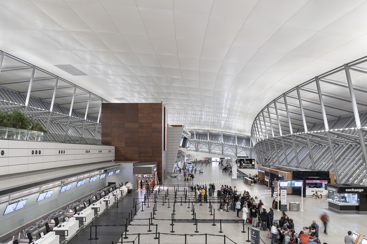 Carrasco International Airport's interior featuring sustainable ERCO LED lighting.