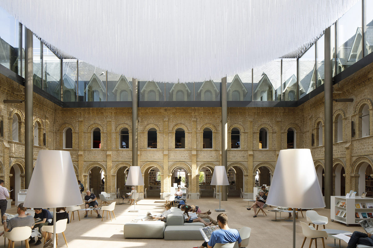 Les Franciscaines cultural venue featuring ERCO lighting, enhancing the inviting atmosphere and architectural details.