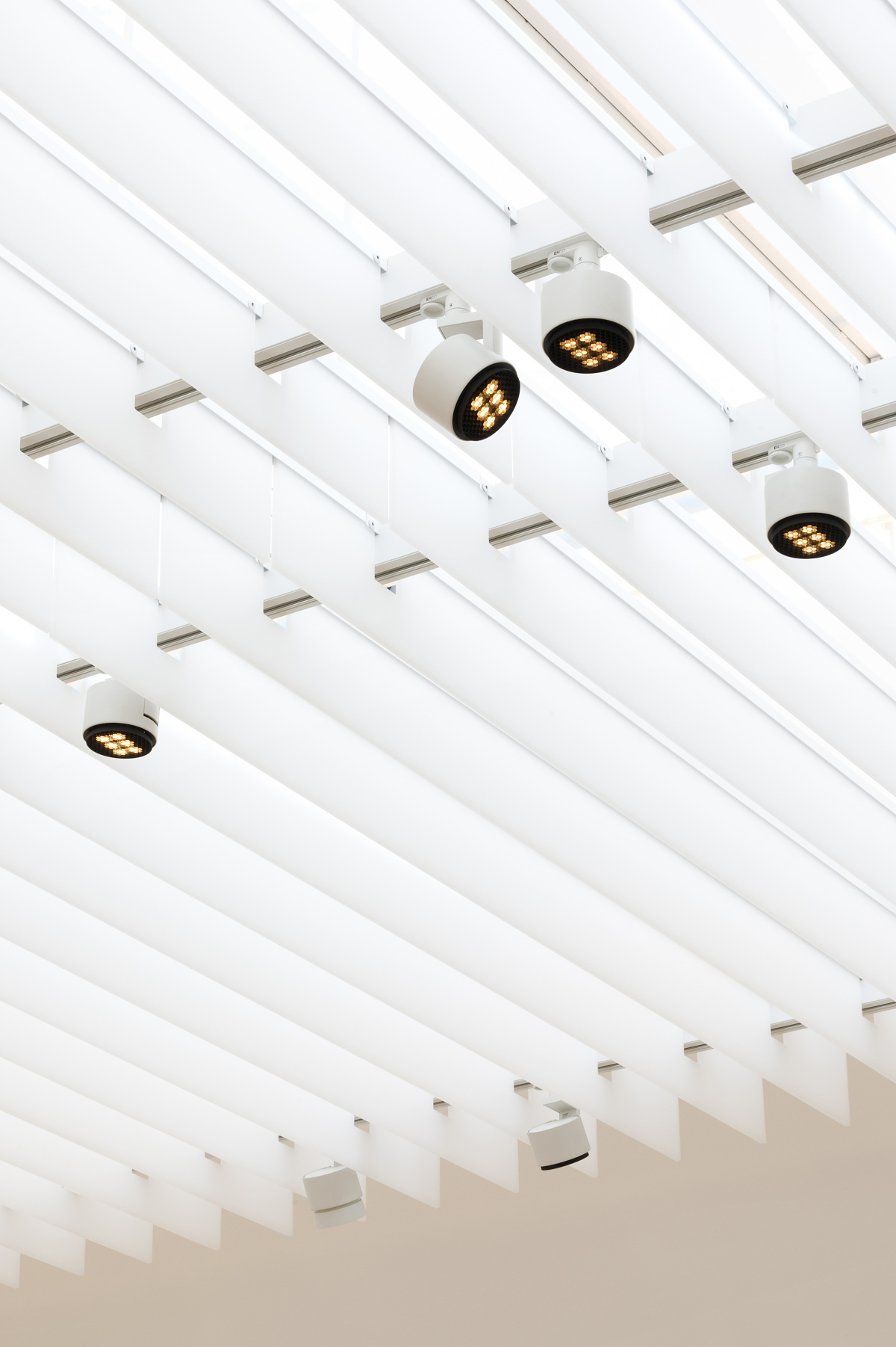 ERCO Parscan spotlights illuminating the ceiling at Les Franciscaines, Deauville.