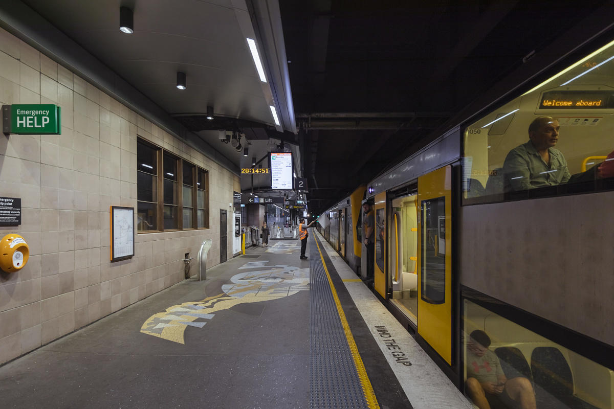 Train station platform with ERCO outdoor luminaires for safety and orientation.