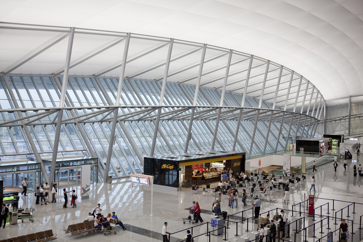 Airport terminal featuring robust ERCO outdoor luminaires for efficient lighting.