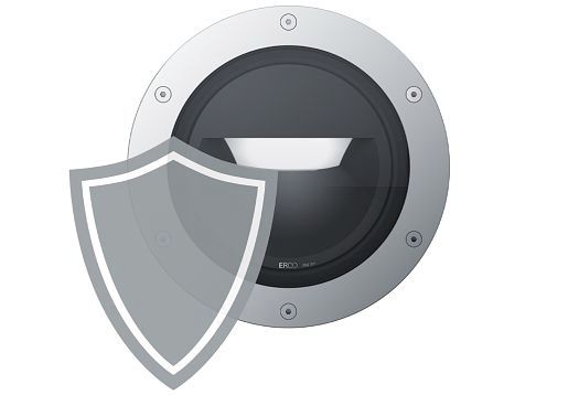 ERCO outdoor luminaire with shield, designed for robust station lighting.