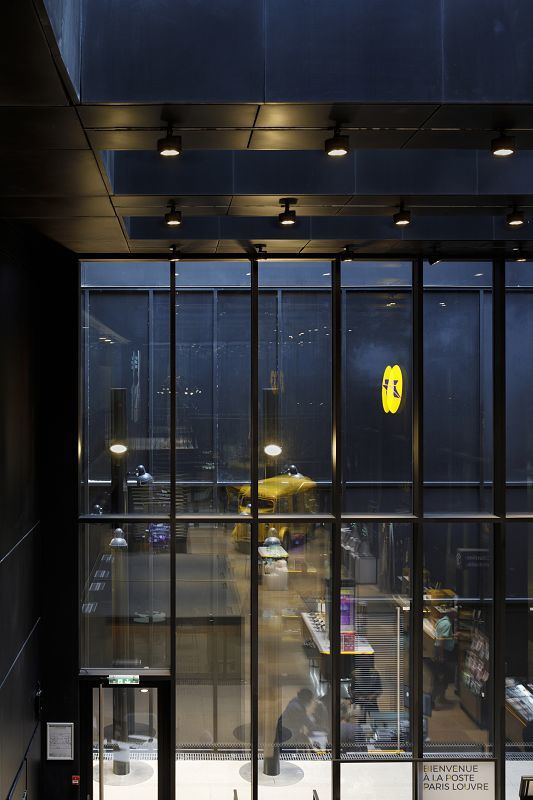ERCO Parscan LED spotlights providing accent lighting in the Louvre Post Office, Paris.