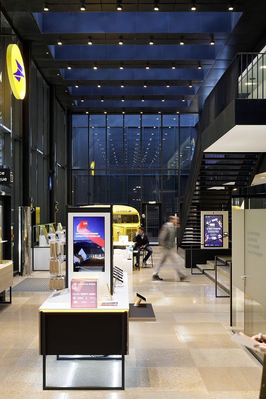 ERCO Parscan LED spotlights providing accent lighting in the Louvre Post Office, Paris.