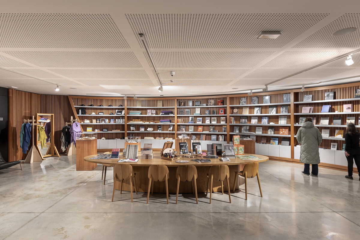 MACA museum shop interior featuring ERCO LED lighting, highlighting books and merchandise.