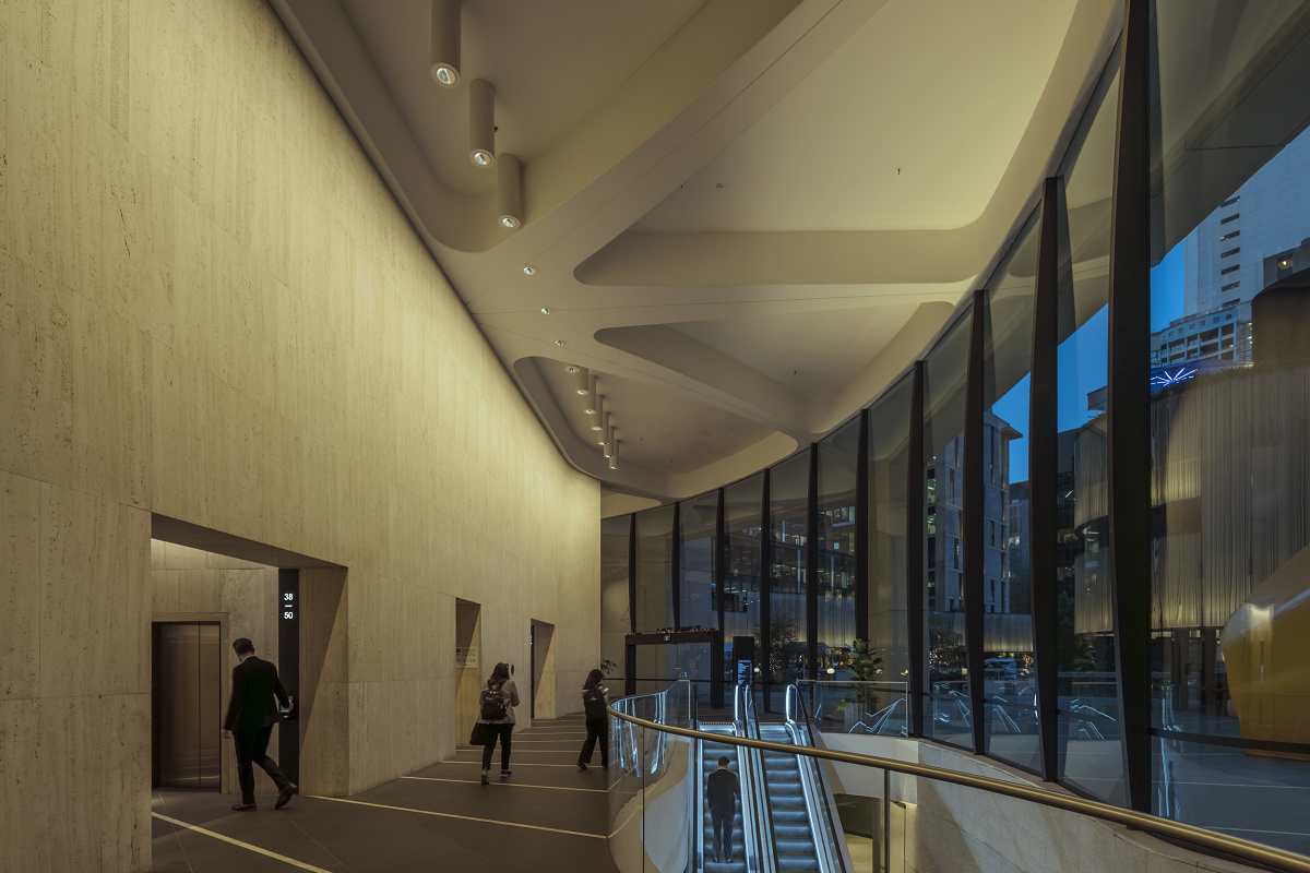 ERCO LED lighting wallwashing in Martin Place, Sydney, illuminating high rooms and artworks.