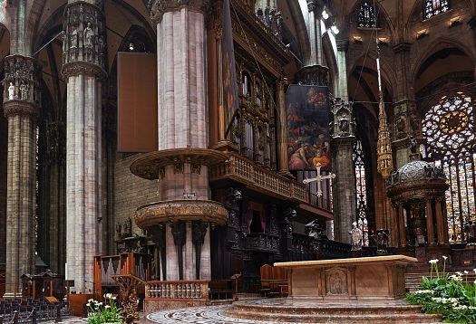 Interior of Milan Cathedral featuring ERCO LED lighting, highlighting architectural details.