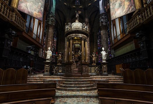 Interior of Milan Cathedral featuring ERCO LED lighting, highlighting architectural details and grandeur.