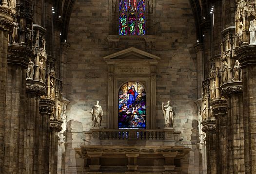 Interior of Milan Cathedral featuring ERCO LED lighting, highlighting architectural details.