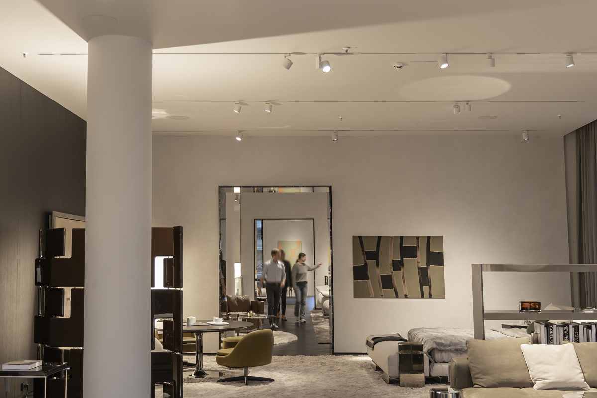 Minotti Flagship Store interior featuring ERCO LED spotlights for accent lighting.